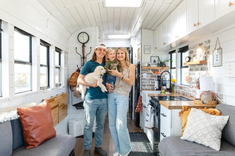 Family of three enjoying their tiny home on wheels.