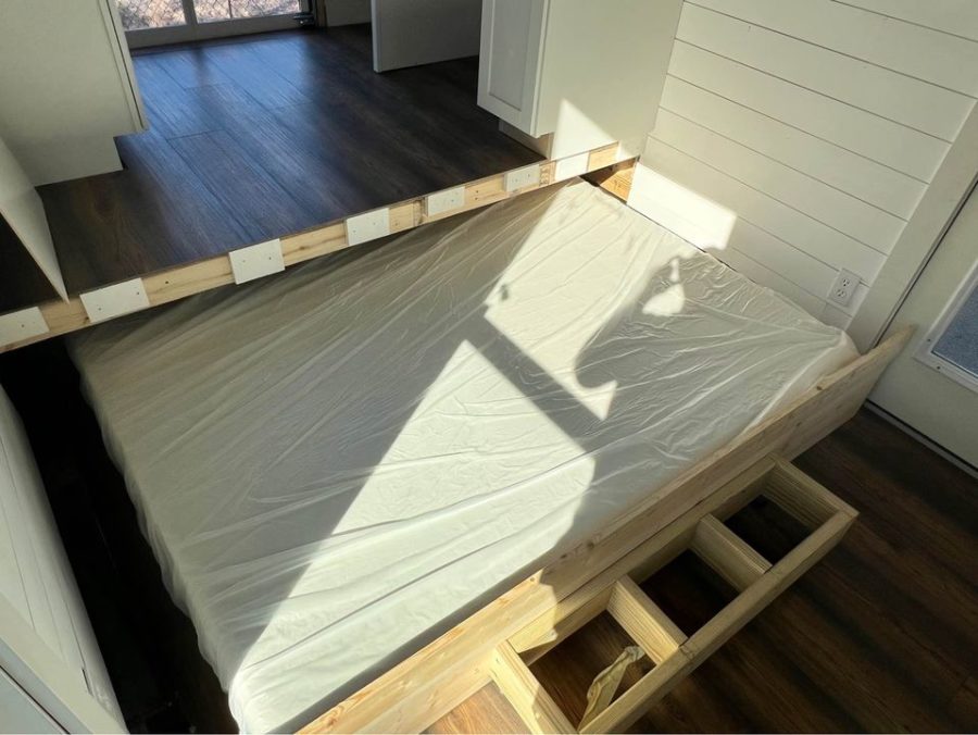 Pull-Out Under-Floor Bed in This Tiny House for Sale 3
