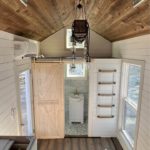 Pull-Out Under-Floor Bed in This Tiny House for Sale 5