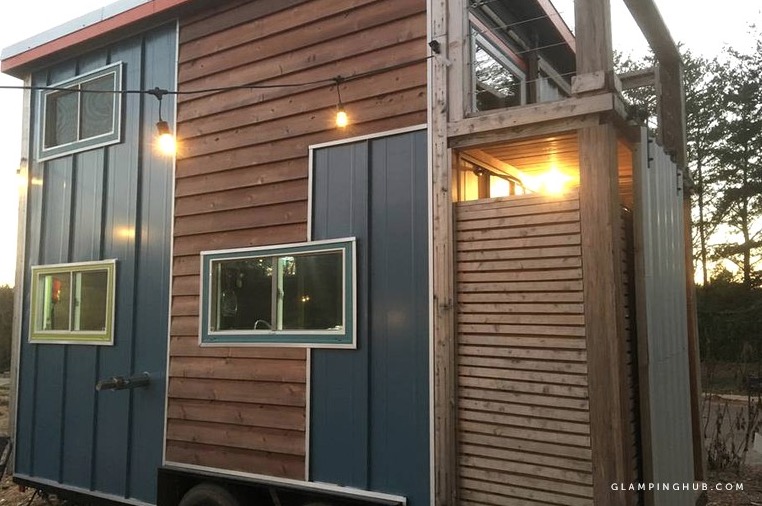 Quirky industrial-style tiny house on wheels with PRIVATE built-in outdoor shower