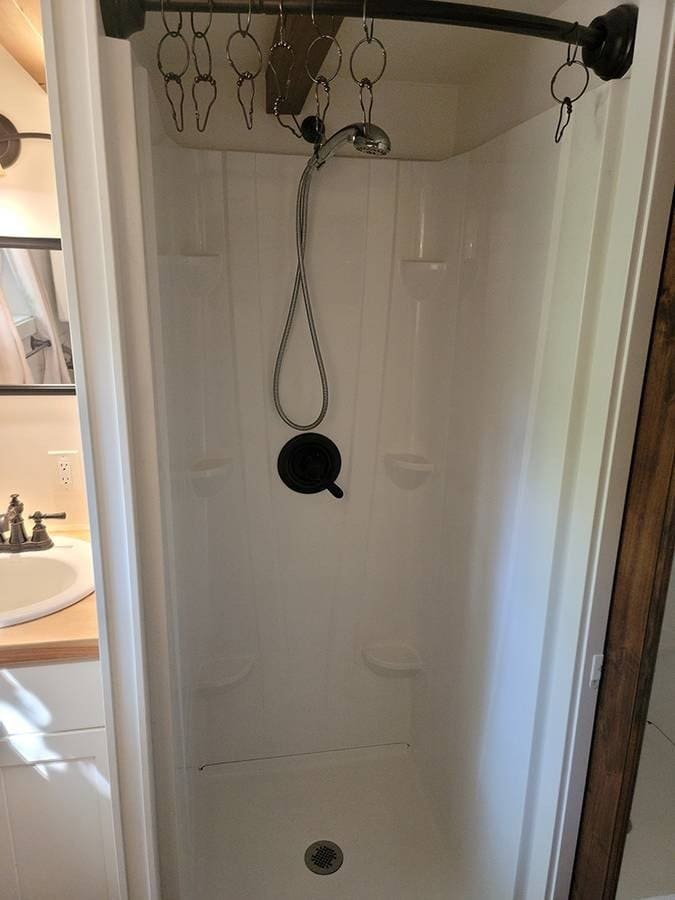 Alki Tiny House shower with compact design and modern fixtures.