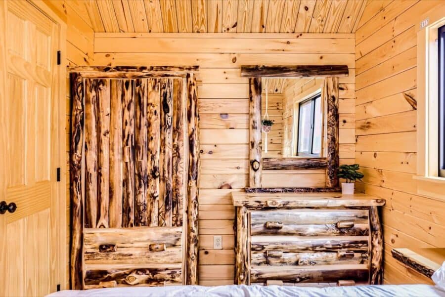Log Cabin Interior with Rustic Wooden Furniture and Natural Wood Walls.