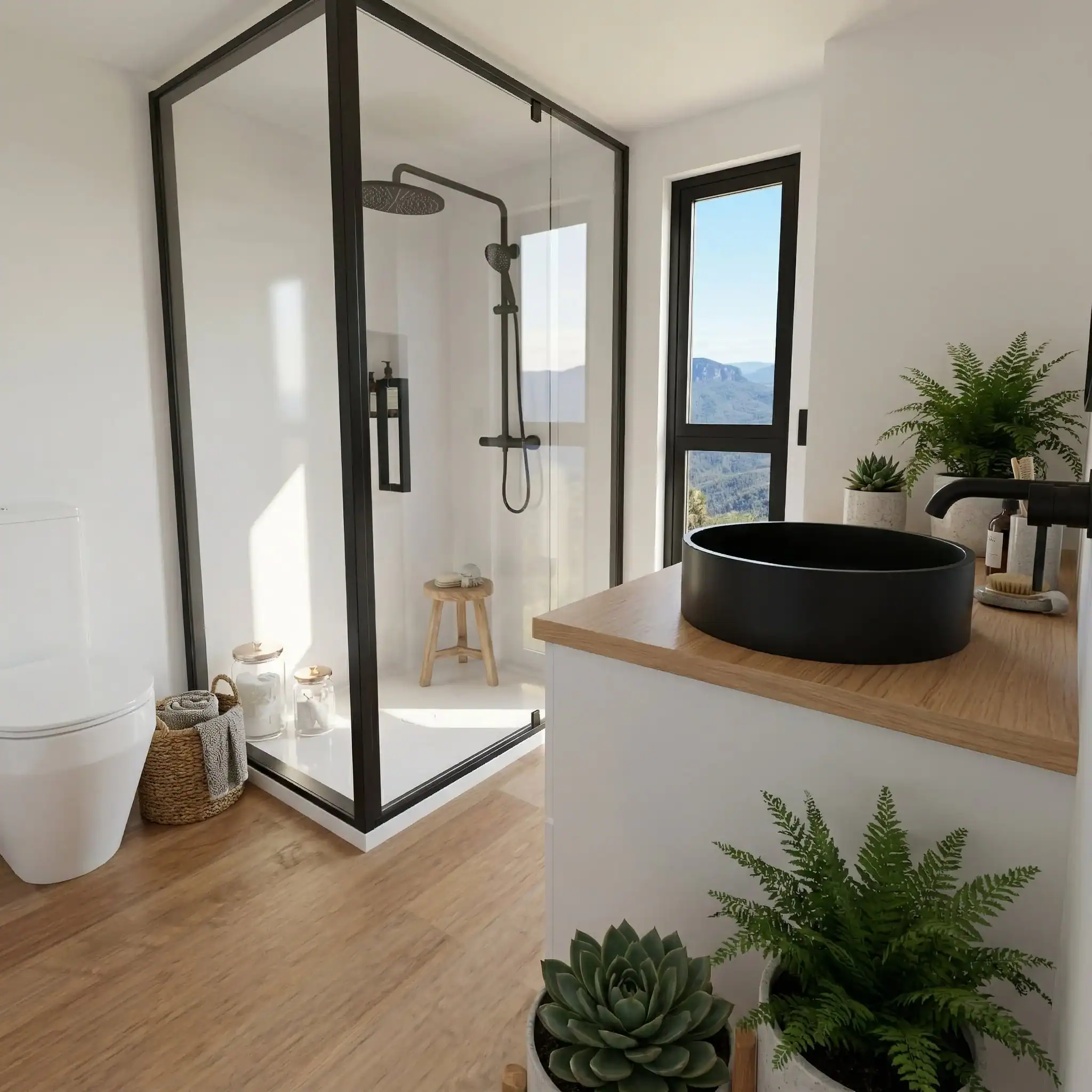 The Removed Byron Bay bathroom with a black-framed glass shower, timber vanity, black vessel sink, and a picture window