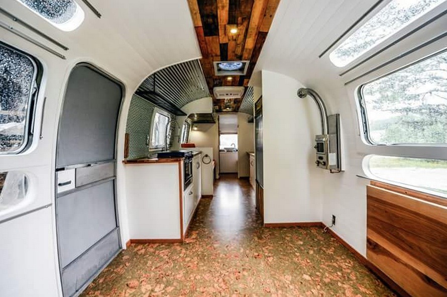 Renovated 27-foot Airstream Tiny House by Wind River Tiny Homes - interior view of camper