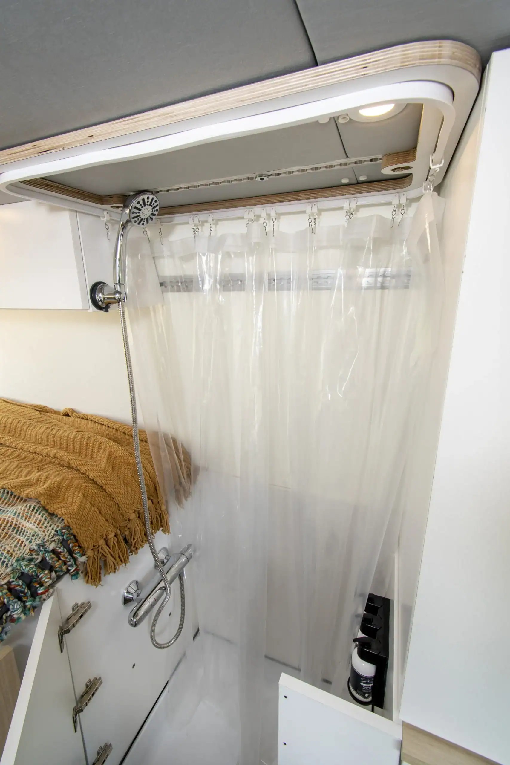 Roameo ProMaster 159 rear doors open showing full interior layout and bed platform