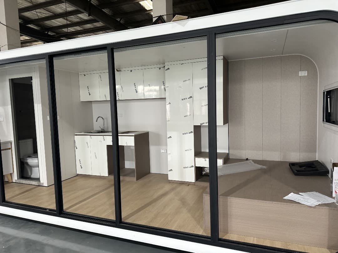 Detail view of RUMI PODS studio tiny home showing build quality and modern finishes