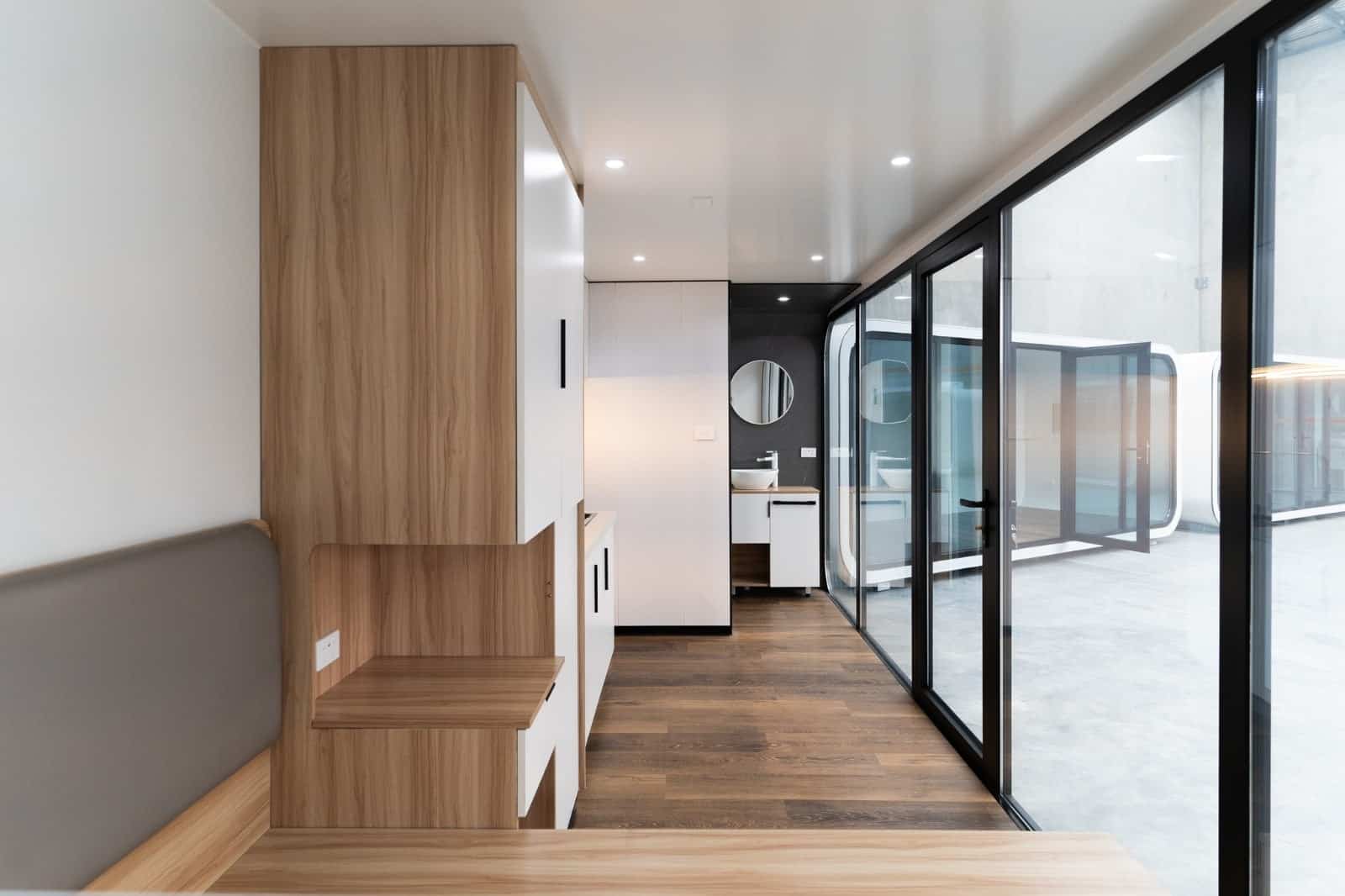 Interior view of RUMI PODS studio tiny home with modern finishes and SPC flooring