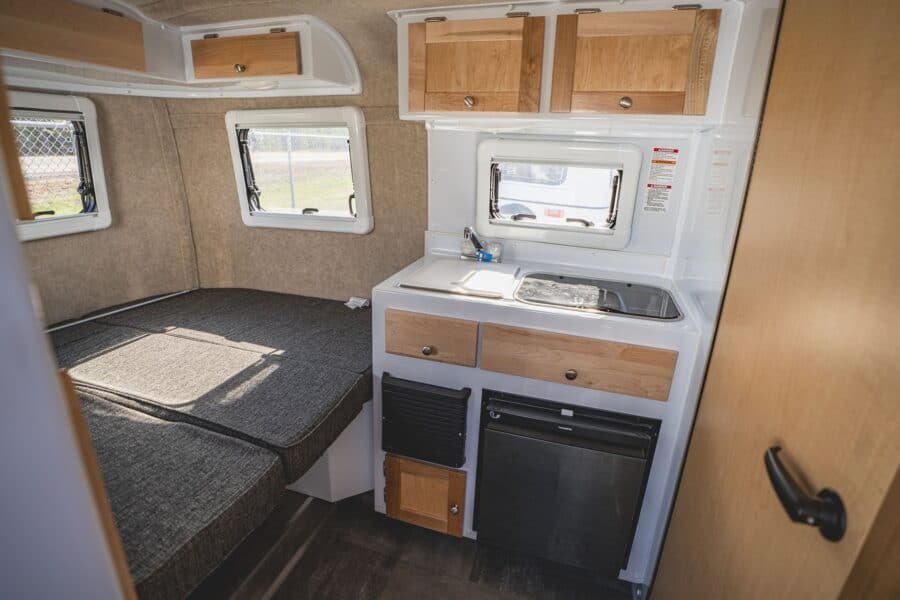 Rear bed and galley with maple cabinets
