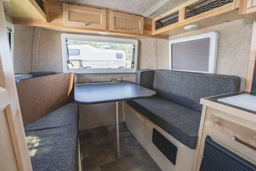 Rear dinette with a table below the back window