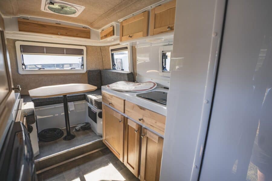 Maple galley and rear dinette with a light table