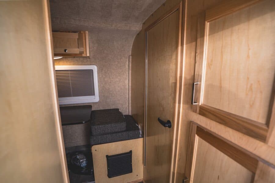 Wood bathroom and closet doors at the front