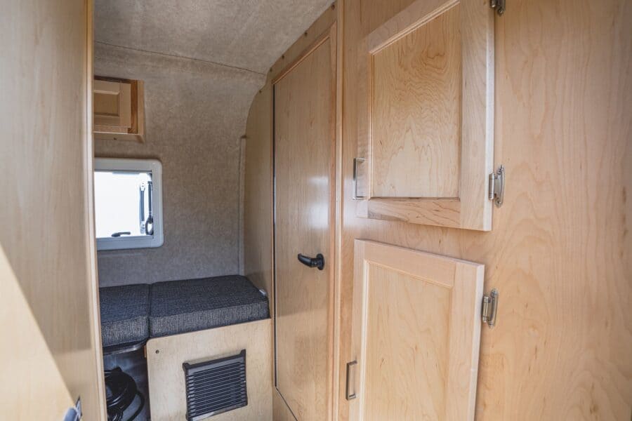 Wood bathroom and closet doors at the front