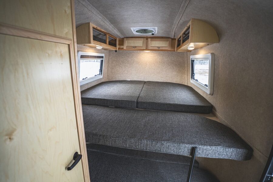Loft bed over the fifth-wheel hitch