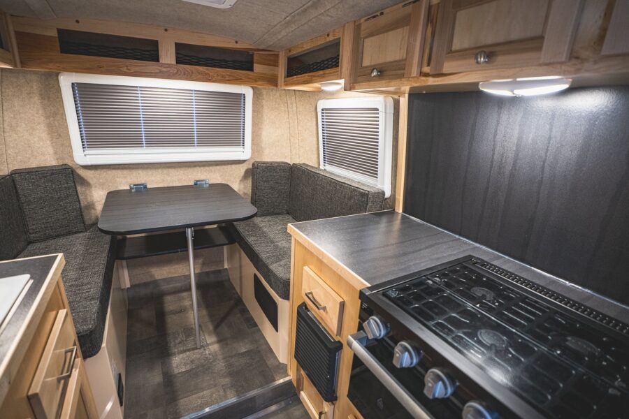 Rear dinette and stovetop seen from the galley