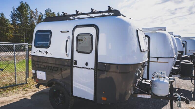 Scamp X with a dark grey lower shell, roof rack, and off-road tires
