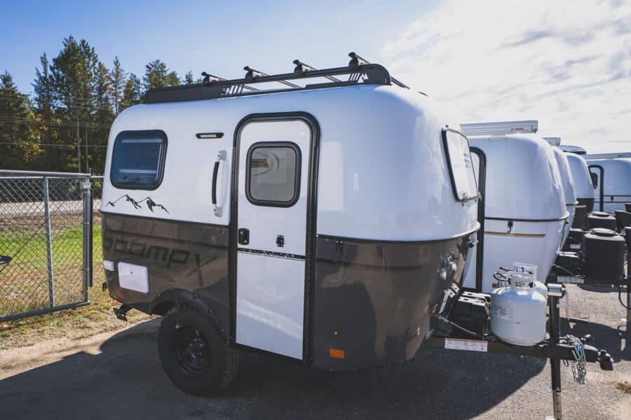 Scamp X with a dark grey lower shell, roof rack, and off-road tires