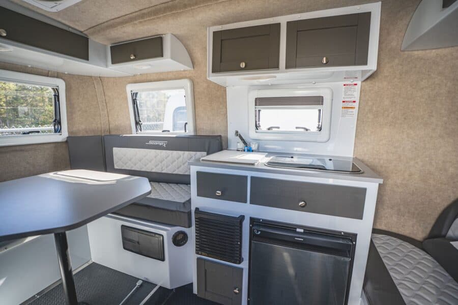 Galley and rear U-dinette with a table