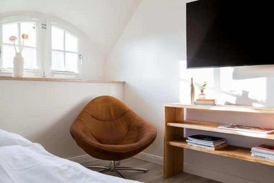 Charming 387 sq. ft. German cottage guesthouse with modern decor and small space comfort.
