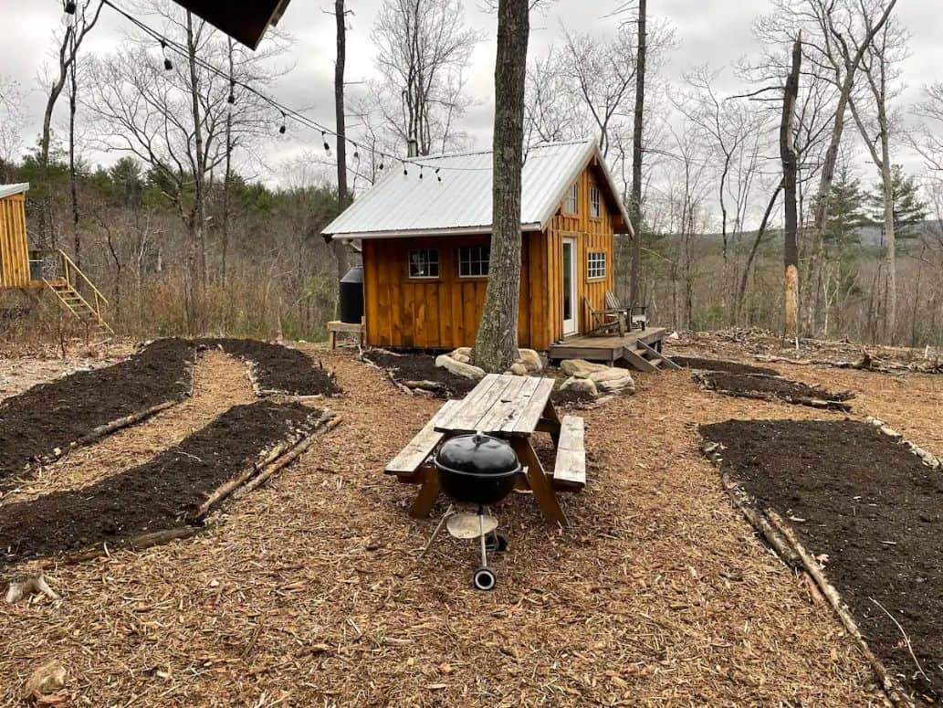 View of Semi-Off-Grid Cabin in Massachusetts with Board & Batten Siding