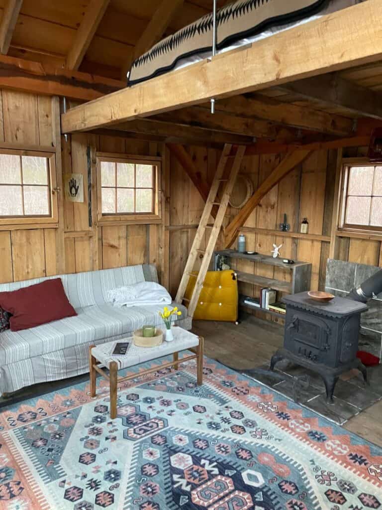 View of Semi-Off-Grid Cabin in Massachusetts with Board & Batten Siding