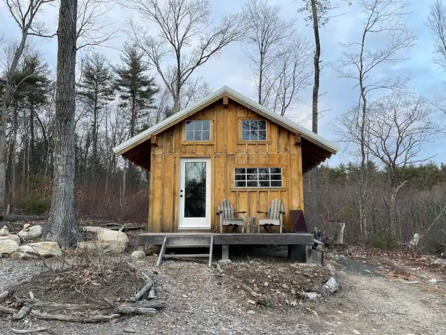 View of Semi-Off-Grid Cabin in Massachusetts with Board & Batten Siding