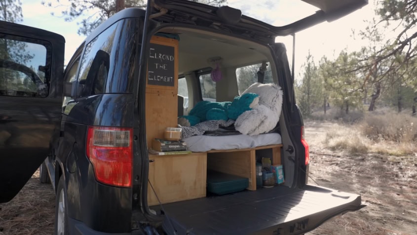 Compact vehicle converted for tiny living and outdoor adventures.