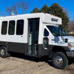 Shuttle Bus To Overland Camper Conversion For Sale via Conversion Trader 001