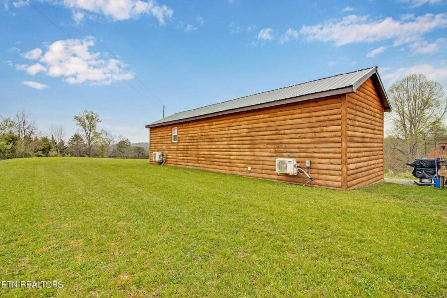 Tiny house with RV hookups on spacious Tennessee property.