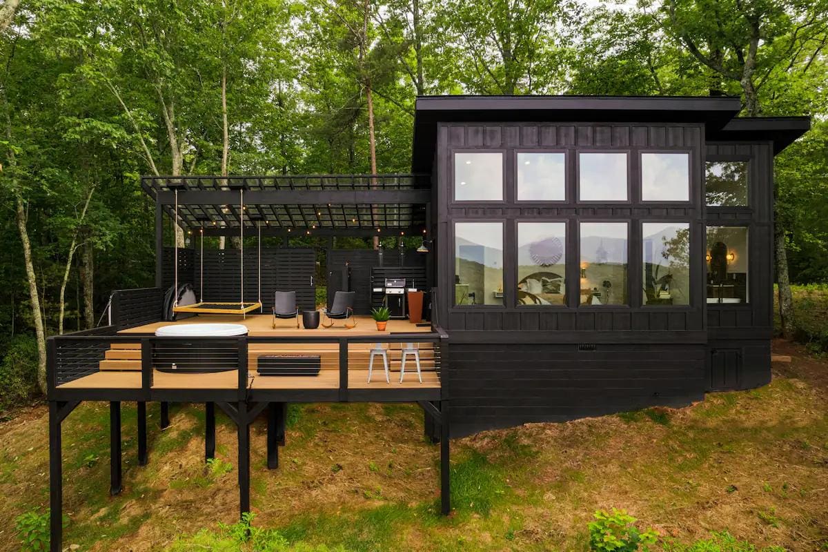 Cabin with outdoor swing bed