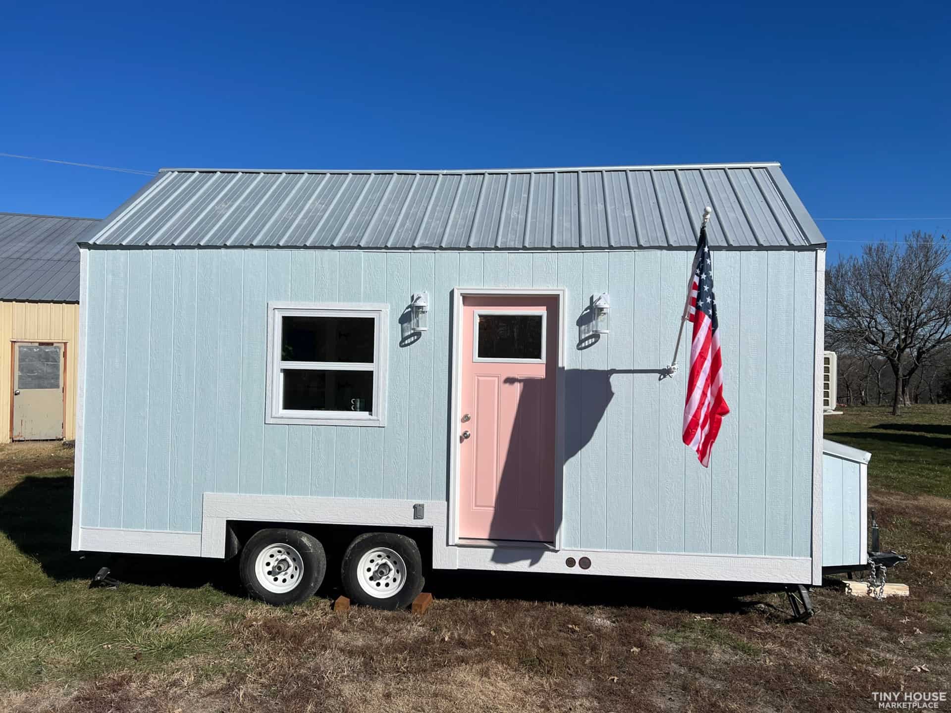 Tiny House with Pink & Teal Exterior