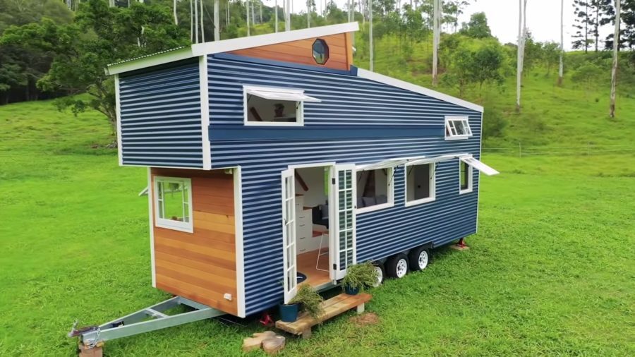 TINY-HOUSE-with-incredible-pop-up-roof-that-EXPANDS-UPWARD-once-parked