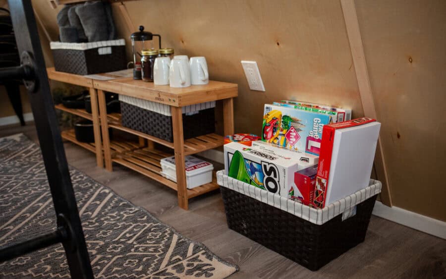 A-frame tiny house interior with books and cozy decor near the Grand Canyon.