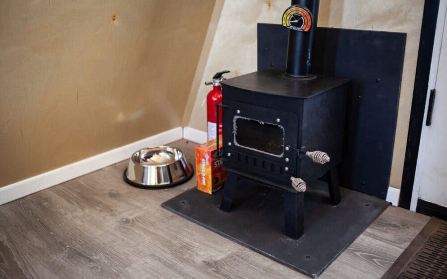 Compact tiny house stove for small space living.