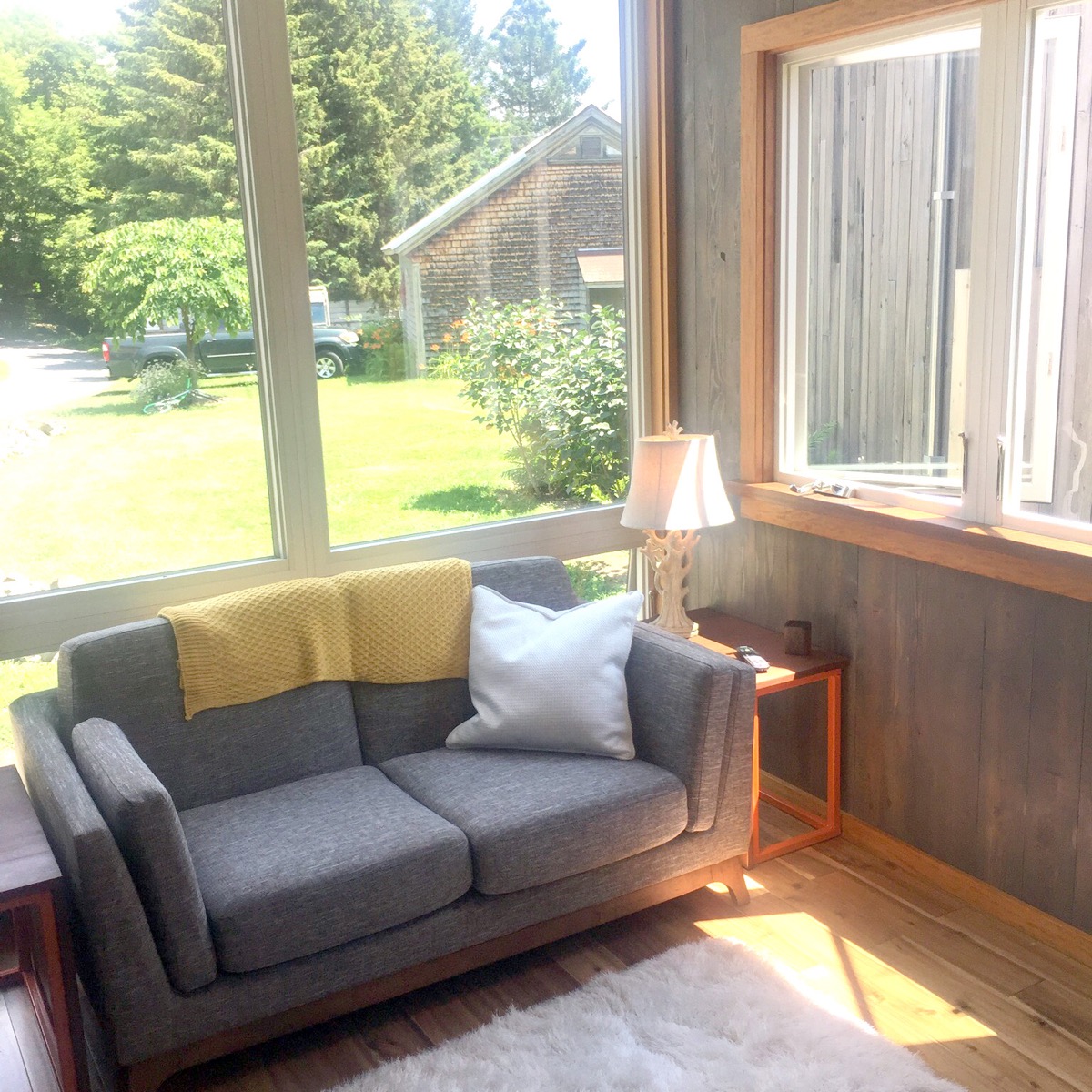 Interior living space with wood stove and comfortable seating