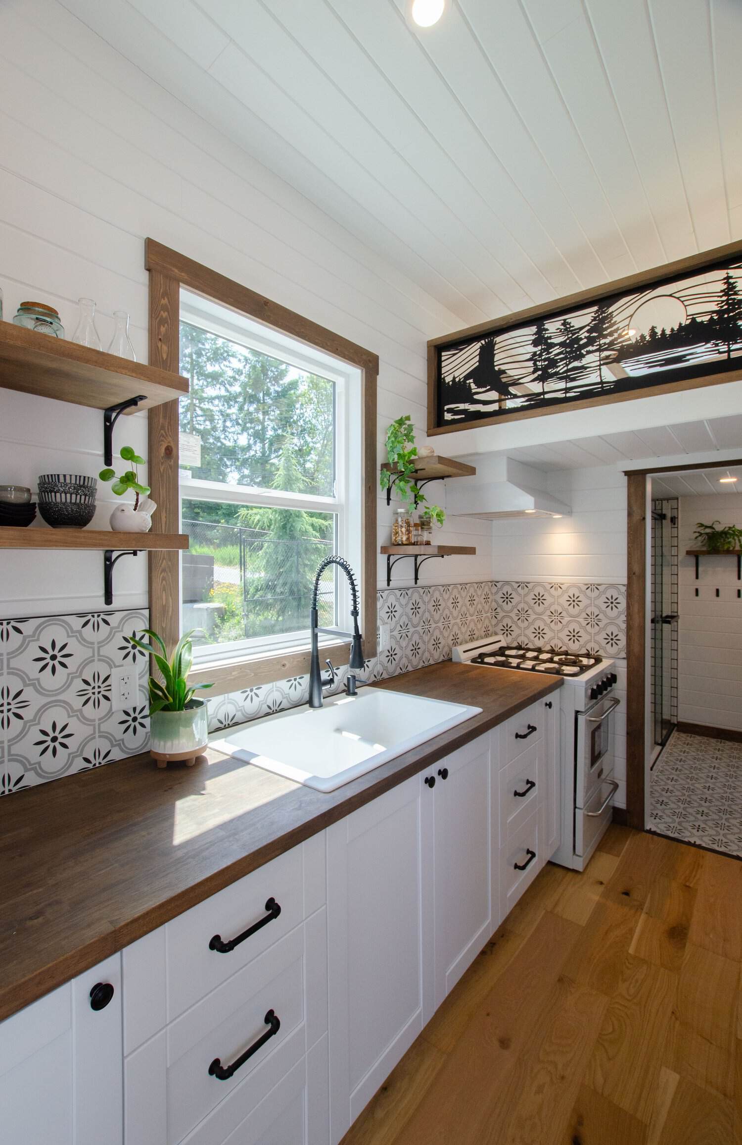 Cozy Arden Tiny House Kitchen by Rewild Homes