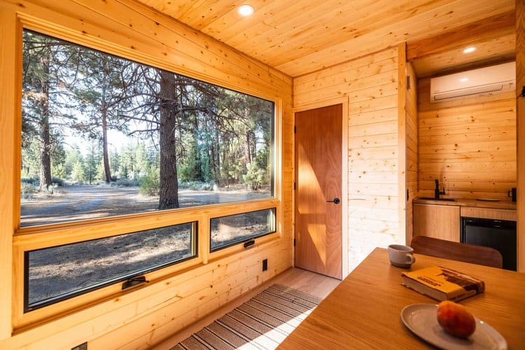 Mid Camp interior showing natural wood tones and high ceilings