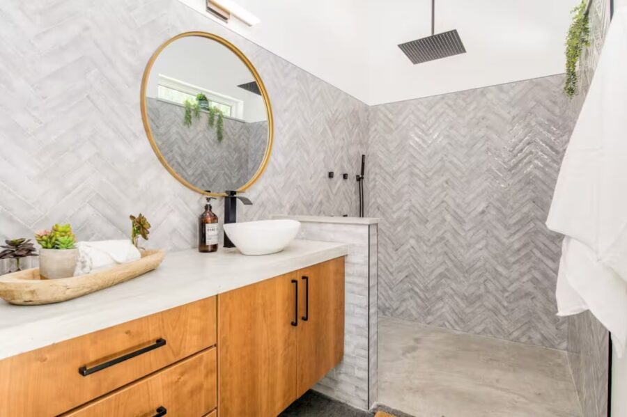 Stylish bathroom in the Pine House with modern fixtures and minimalist decor.