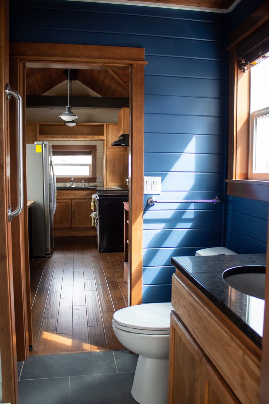 The Pioneer Tiny House on Wheels with a Main Floor Sleeping by Tiny Heirloom 006