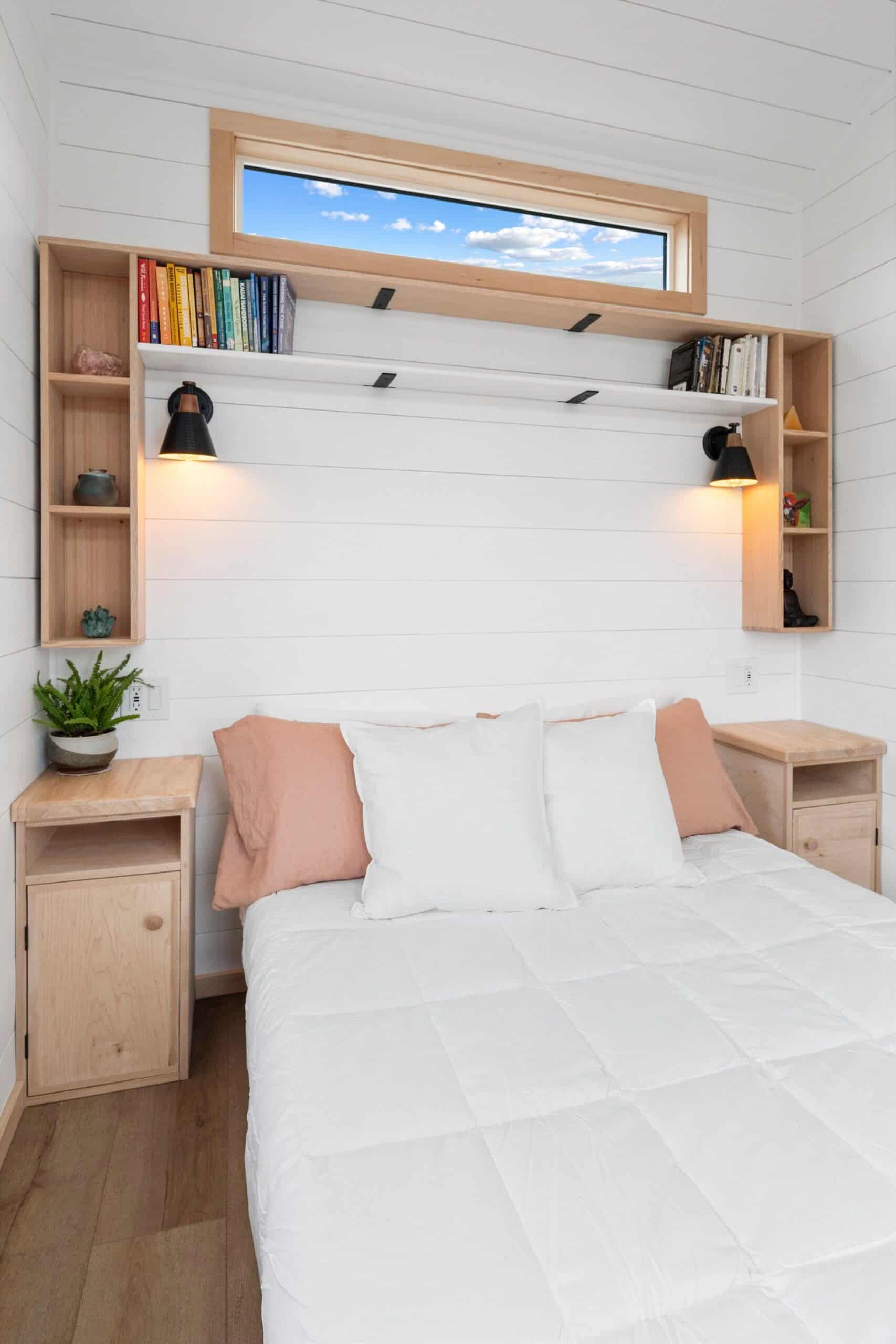 French doors with a transom window opening from the Shasta's main-floor bedroom out to the surrounding landscape