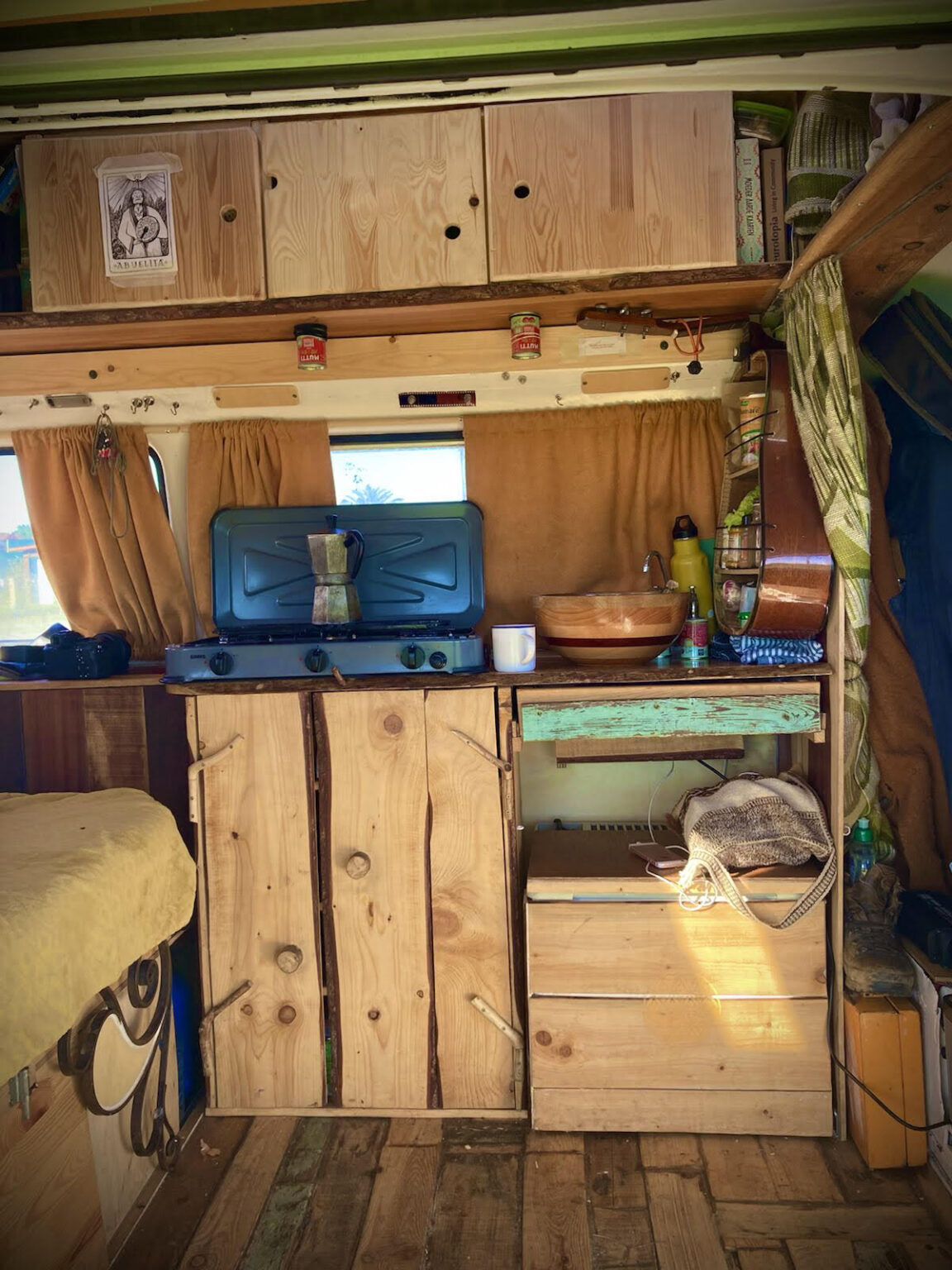 Three Friends Traveling in Their Tiny Camper Van