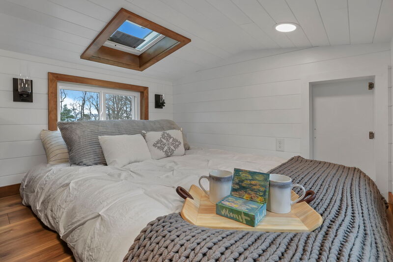 Tink private home office interior with desk space and separate work zone