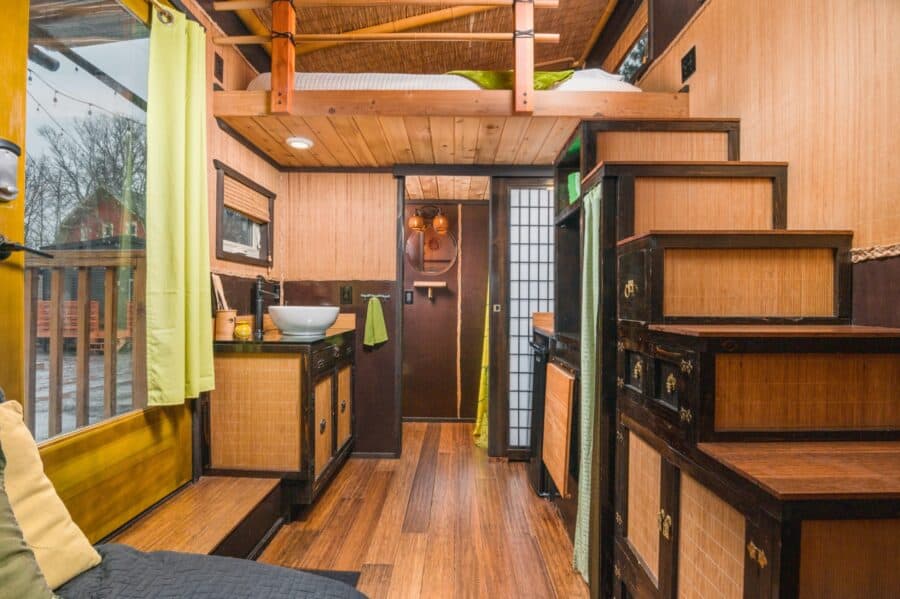 Tansu cabinet stairs and grass cloth walls inside the Bamboo tiny house