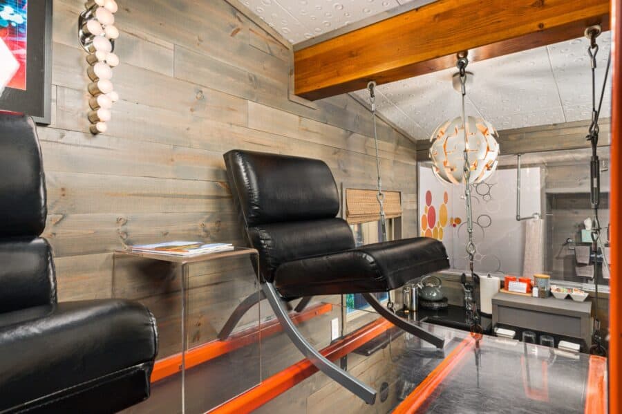 Clear lounge platform and pendant light inside the Modern tiny house