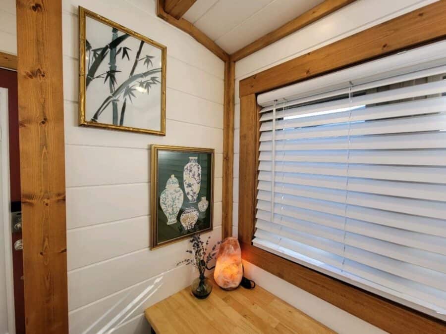 Bamboo art and salt lamp in the desk nook of the Zen tiny house