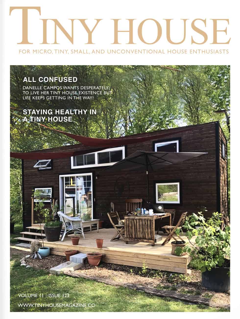 Tiny House Exterior with Outdoor Deck and Greenery