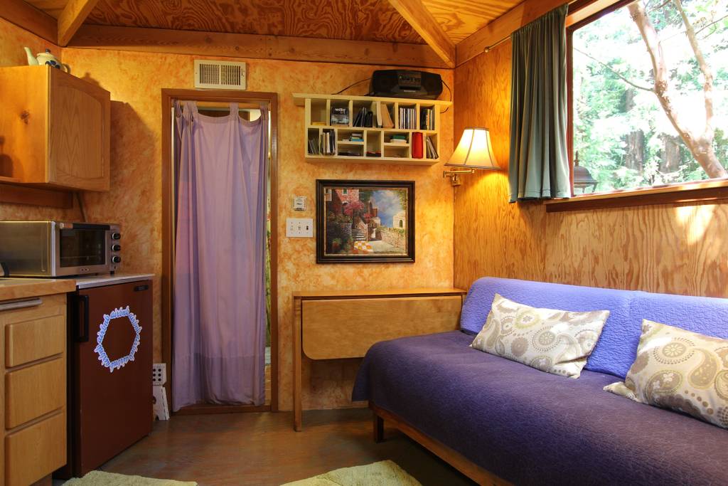 Loft bedroom with Casper mattress beneath geodesic dome apex