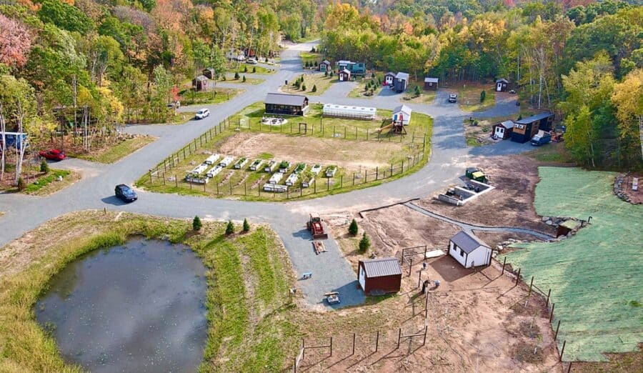 Aerial view of tiny house parking spots and land sharing network setup.
