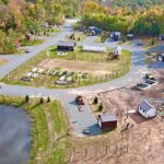 Aerial view of tiny house parking spots and land sharing network setup.