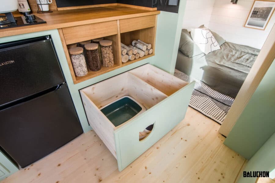 Small house with creative flex room loft and storage solutions.