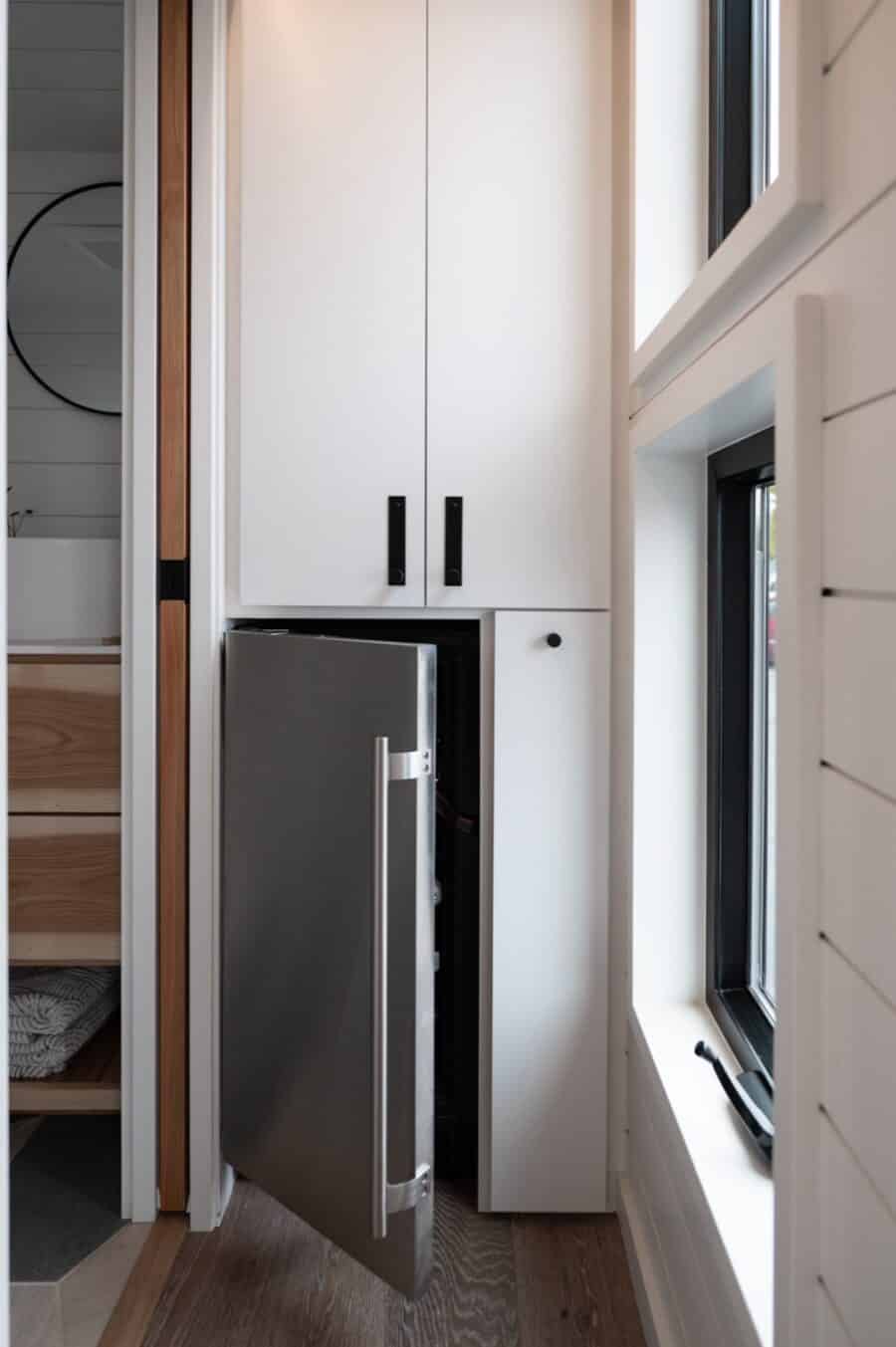 Compact kitchen storage in a tiny house.